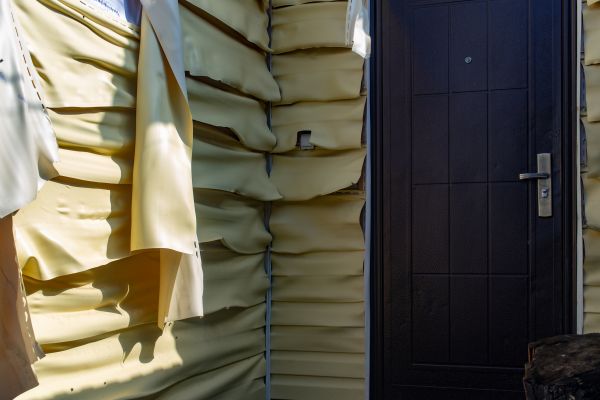 Melted Siding Replacement in Bear