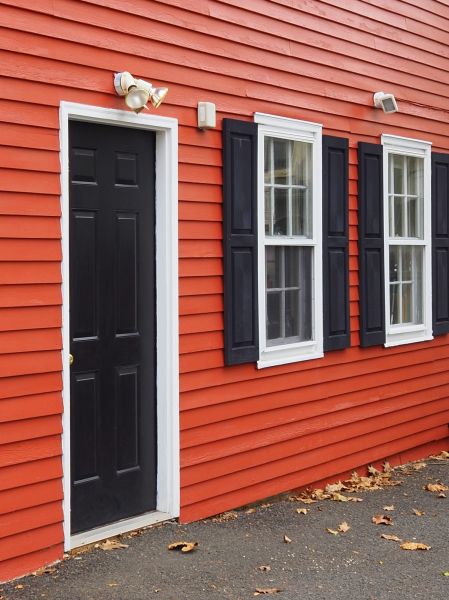 Red Vinyl Siding Installation in Bear
